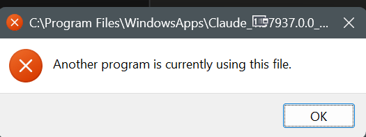 The opening dialog: “Another program is currently using this file.”